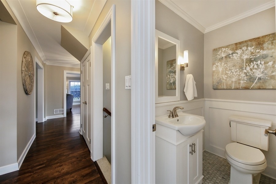 906 South County Line Road Hinsdale, IL 60521 - Photo 32 of 44 a bathroom with a sink and a mirror