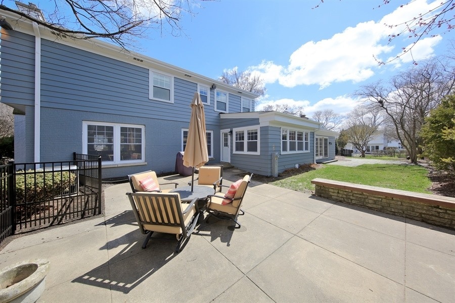 906 South County Line Road Hinsdale, IL 60521 - Photo 36 of 44 a view of a house with backyard and sitting area