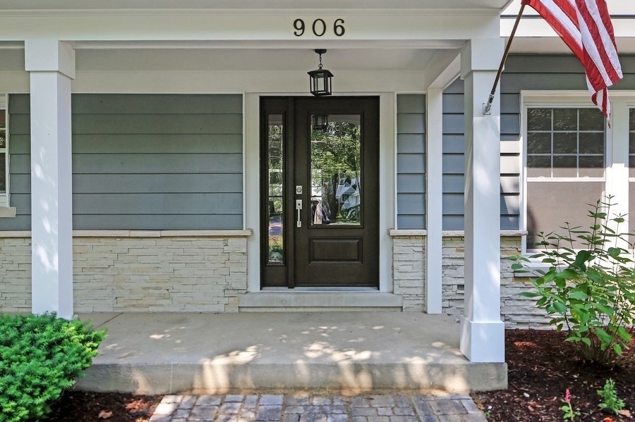 906 South County Line Road Hinsdale, IL 60521 - Photo 41 of 44 a front view of a house with a yard