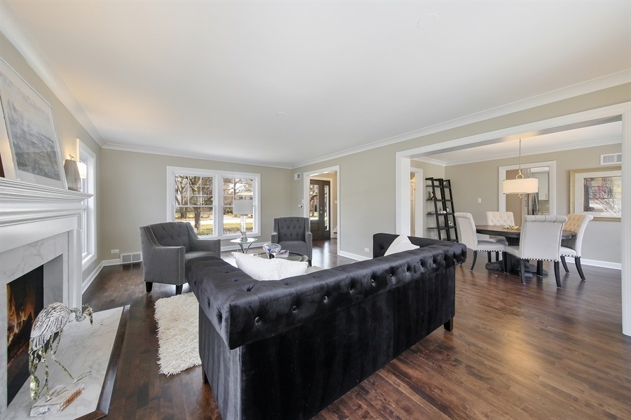 906 South County Line Road Hinsdale, IL 60521 - Photo 6 of 44 a view of a dining room with furniture window and wooden floor