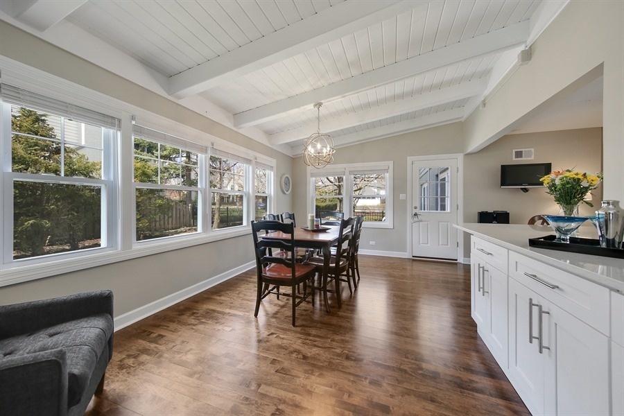 906 South County Line Road Hinsdale, IL 60521 - Photo 10 of 44 a dining room with furniture window wooden floor