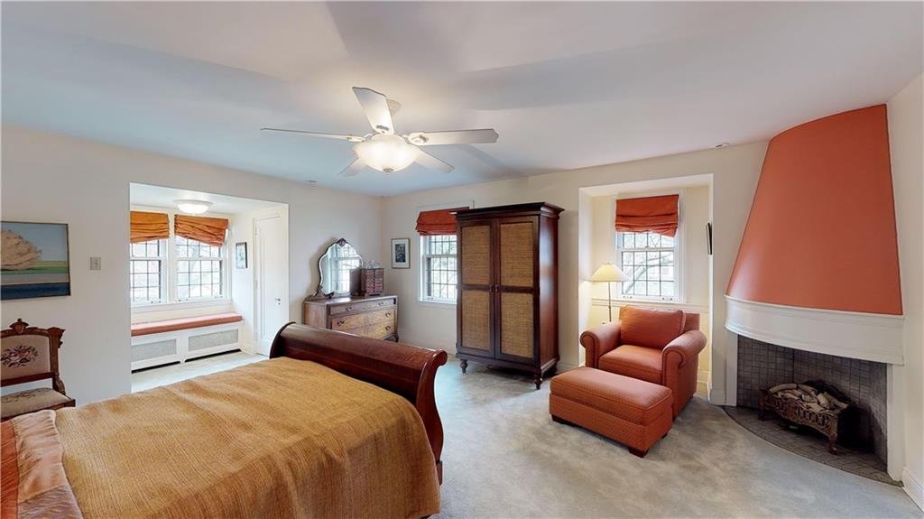 5426 Darlington Road Pittsburgh, PA 15217 - Photo 18 of 24 a bedroom with furniture a bed and a window