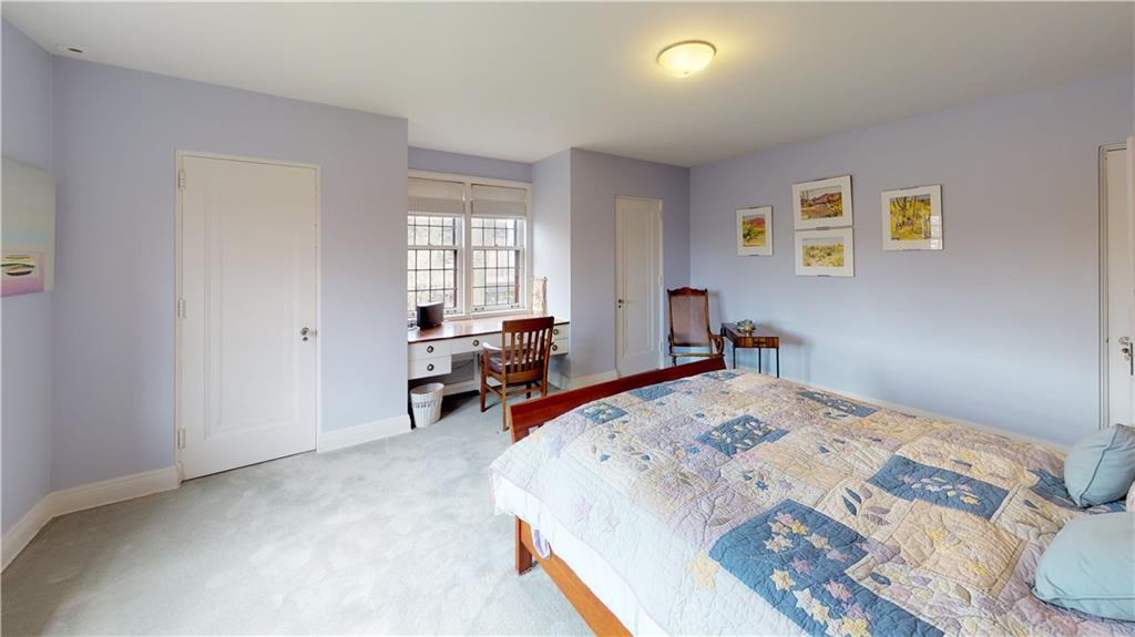 5426 Darlington Road Pittsburgh, PA 15217 - Photo 21 of 24 a bed room with a bed and furniture