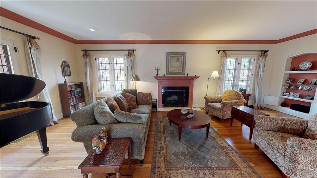 5426 Darlington Road Pittsburgh, PA 15217 - Photo 8 of 24 a living room with furniture fireplace and window