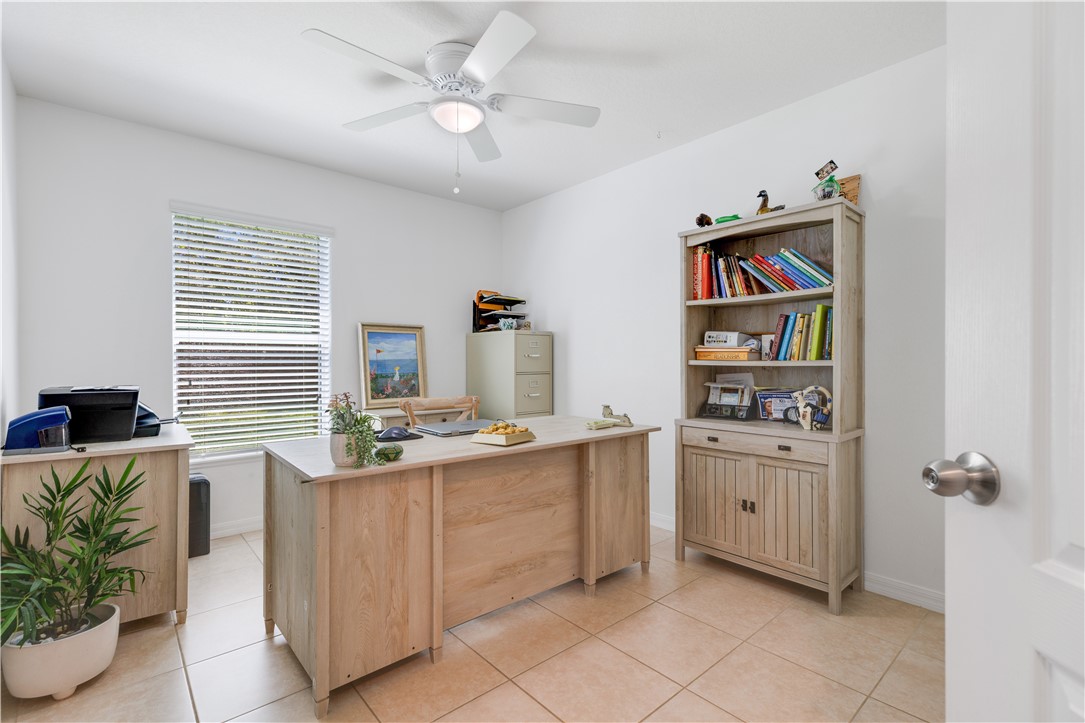 402 Lexington Avenue Southwest Vero Beach, FL 32962 - Photo 20 of 33 a view of a workspace with furniture and a window