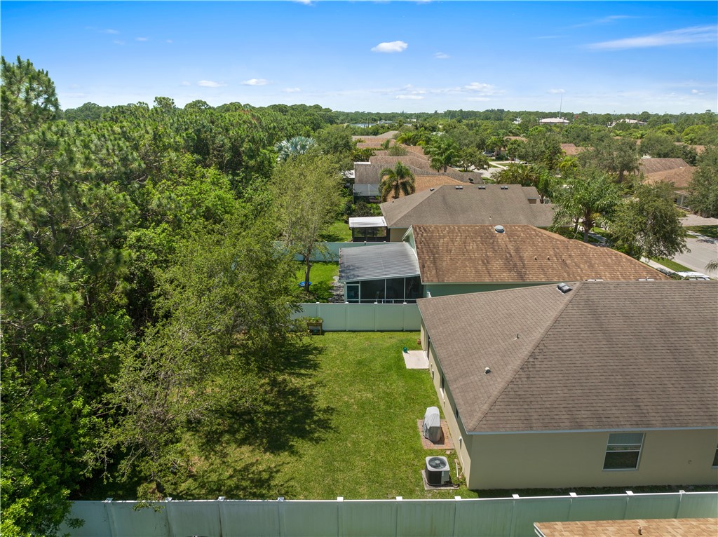 402 Lexington Avenue Southwest Vero Beach, FL 32962 - Photo 27 of 33 a aerial view of a house with a yard