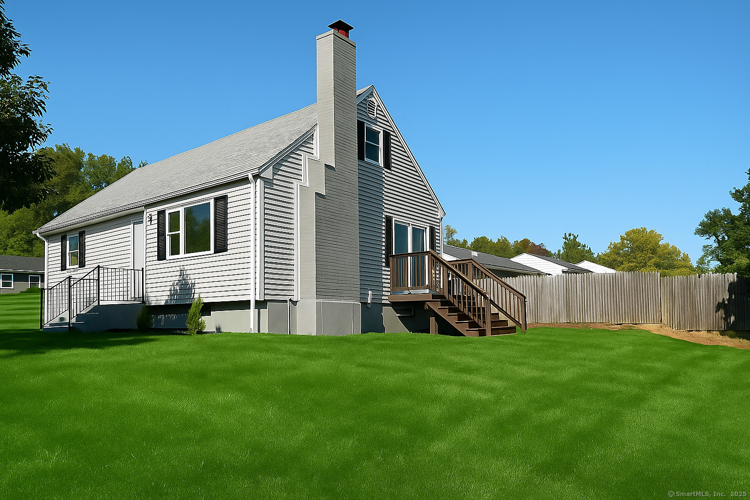 a view of a house with a yard and porch