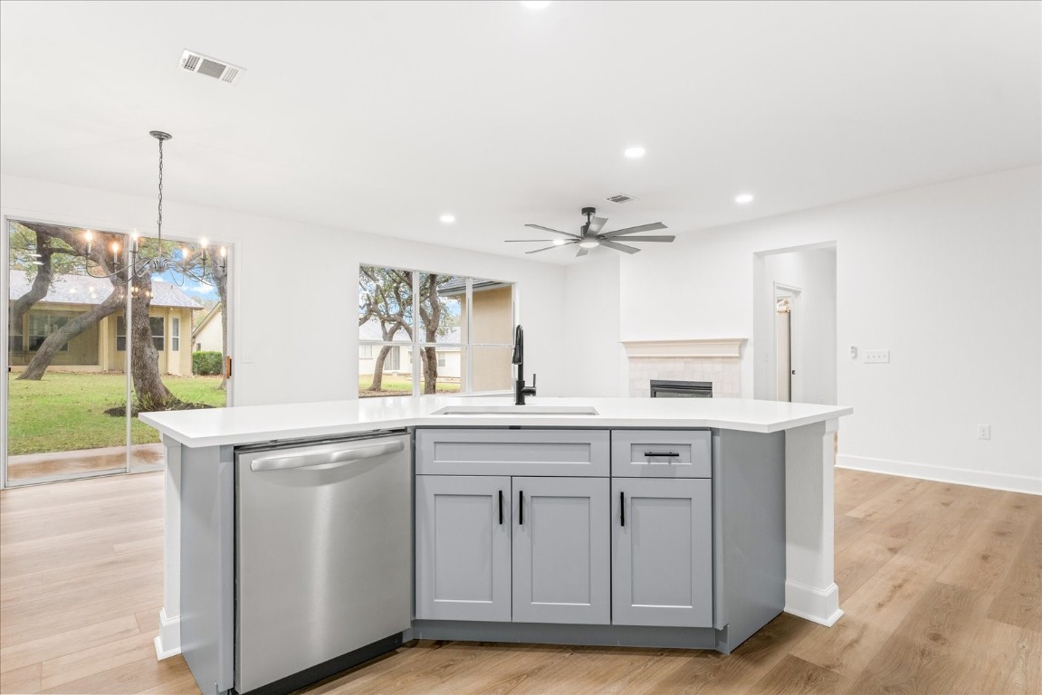 151 Dan Moody Trail Georgetown, TX 78633 - Photo 17 of 31 a kitchen with cabinets and sink