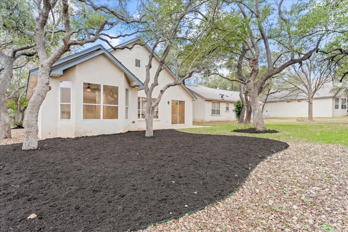 151 Dan Moody Trail Georgetown, TX 78633 - Photo 31 of 31 a view of a house with a yard