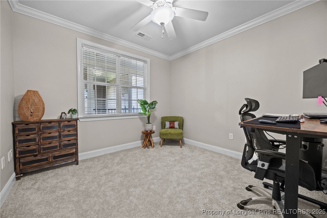 62 Gallery Drive, Unit 302 Spring Lake, NC 28390 - Photo 21 of 34 a view of a workspace with furniture and a window