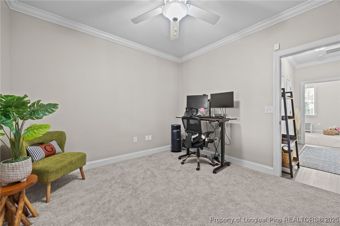 62 Gallery Drive, Unit 302 Spring Lake, NC 28390 - Photo 22 of 34 a view of a workspace with furniture and a window