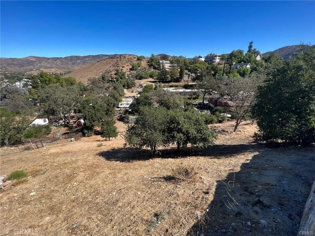 0 Gonzales Road Simi Valley, CA 93063 - Photo 2 of 8 a view of a road with mountains in the background
