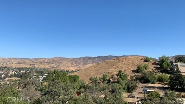 0 Gonzales Road Simi Valley, CA 93063 - Photo 5 of 8 a view of a mountain range in a cloudy sky