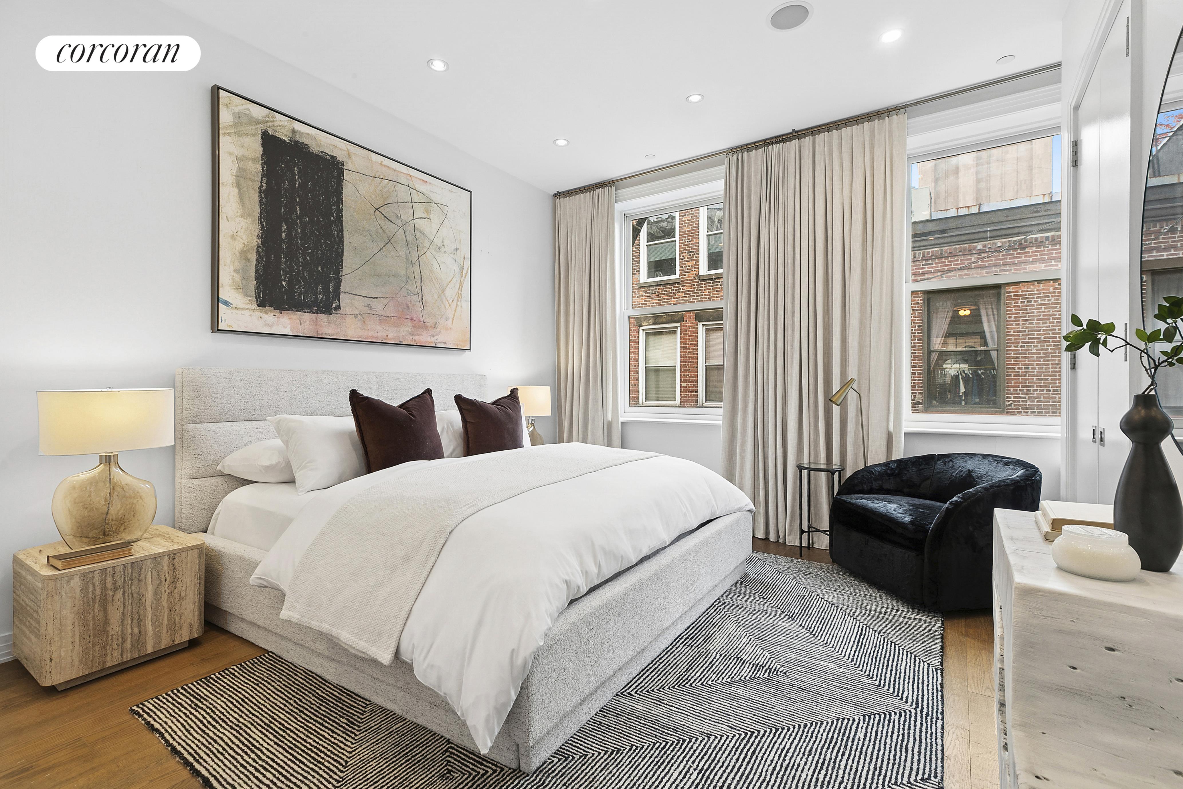 46 Lispenard Street, Unit 5E Manhattan, NY 10013 - Photo 4 of 8 a bedroom with bed and window