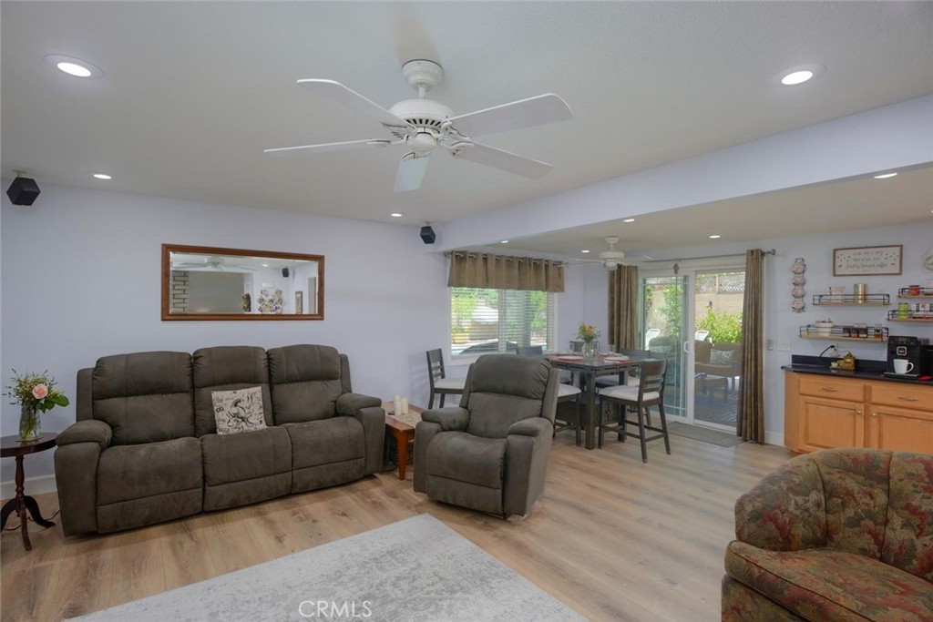 10424 Cartilla Court Rancho Cucamonga, CA 91737 - Photo 11 of 36 a living room with furniture and wooden floor