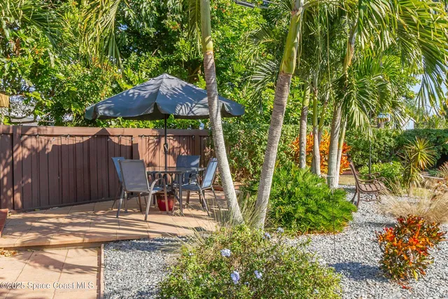 a view of a swimming pool with a yard