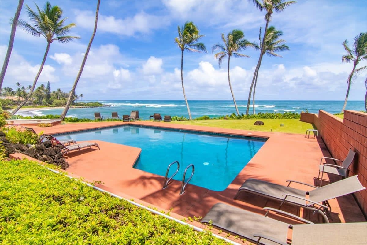 366 Papaloa Road, Unit 114 Kapaa, HI 96746 - Photo 20 of 23 a view of a backyard with swimming pool