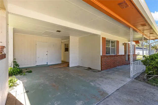 a view of a porch with a yard