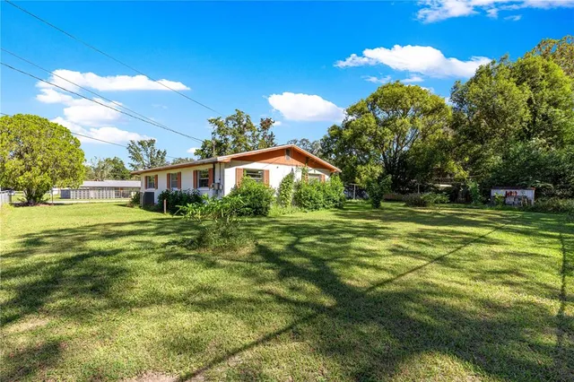 a garden view with a fountain