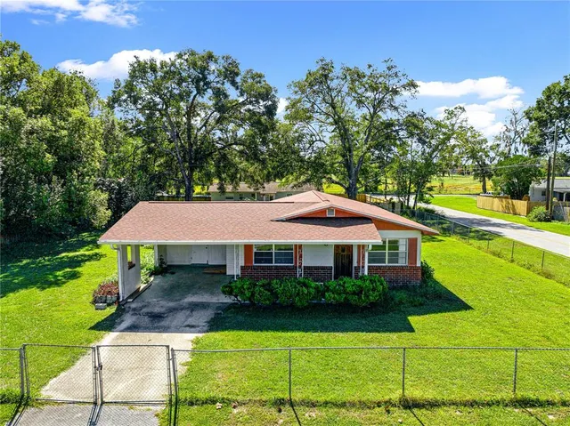 a house view with a garden space