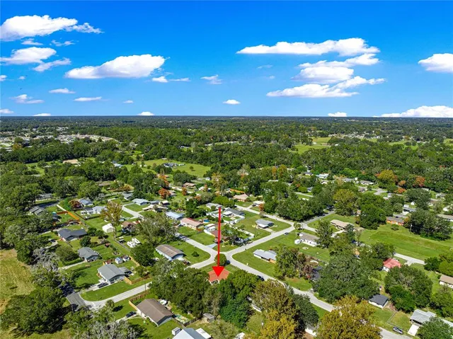 a view of city and green space