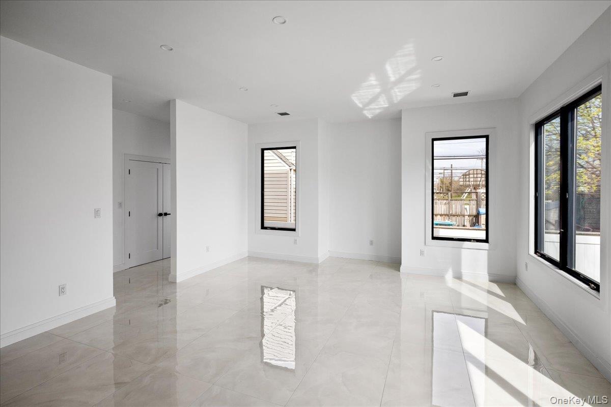 544 Arlington Road Cedarhurst, NY 11516 - Photo 15 of 38 a view of livingroom with window