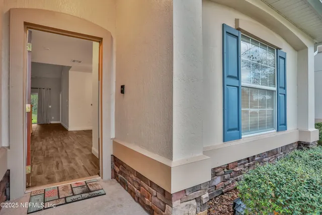 a kitchen with stainless steel appliances kitchen island granite countertop a stove a sink and a microwave