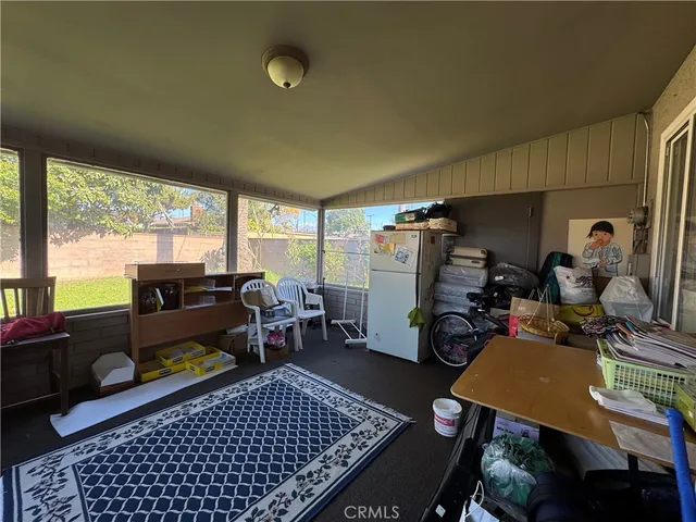 a room with furniture and a table