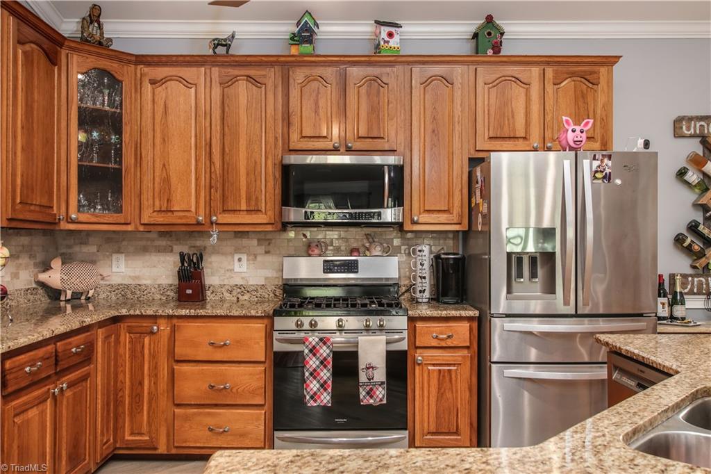 5852 Gallimore Town Road Trinity, NC 27370 - Photo 21 of 50 Gas stove, attached microwave.