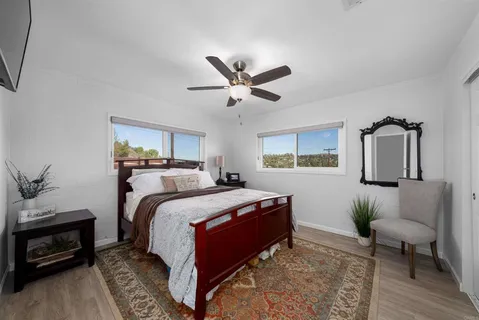 a bed room with a bed and a couch