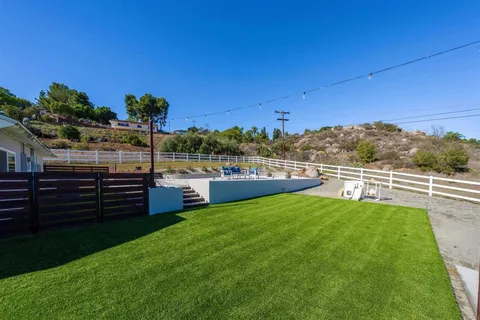 a view of a terrace with chairs