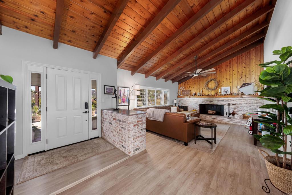 1358 Sundale Road El Cajon, CA 92019 - Photo 4 of 25 a living room with furniture large window and wooden floor