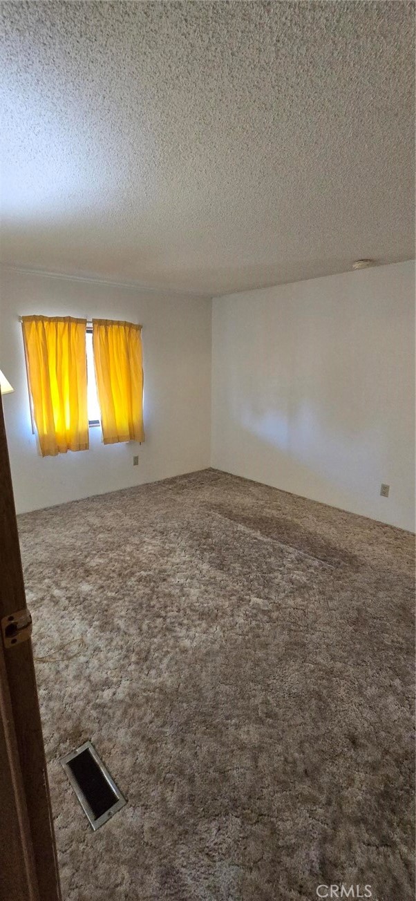 90 3rd Orland, CA 95963 - Photo 8 of 17 a view of an empty room and a window