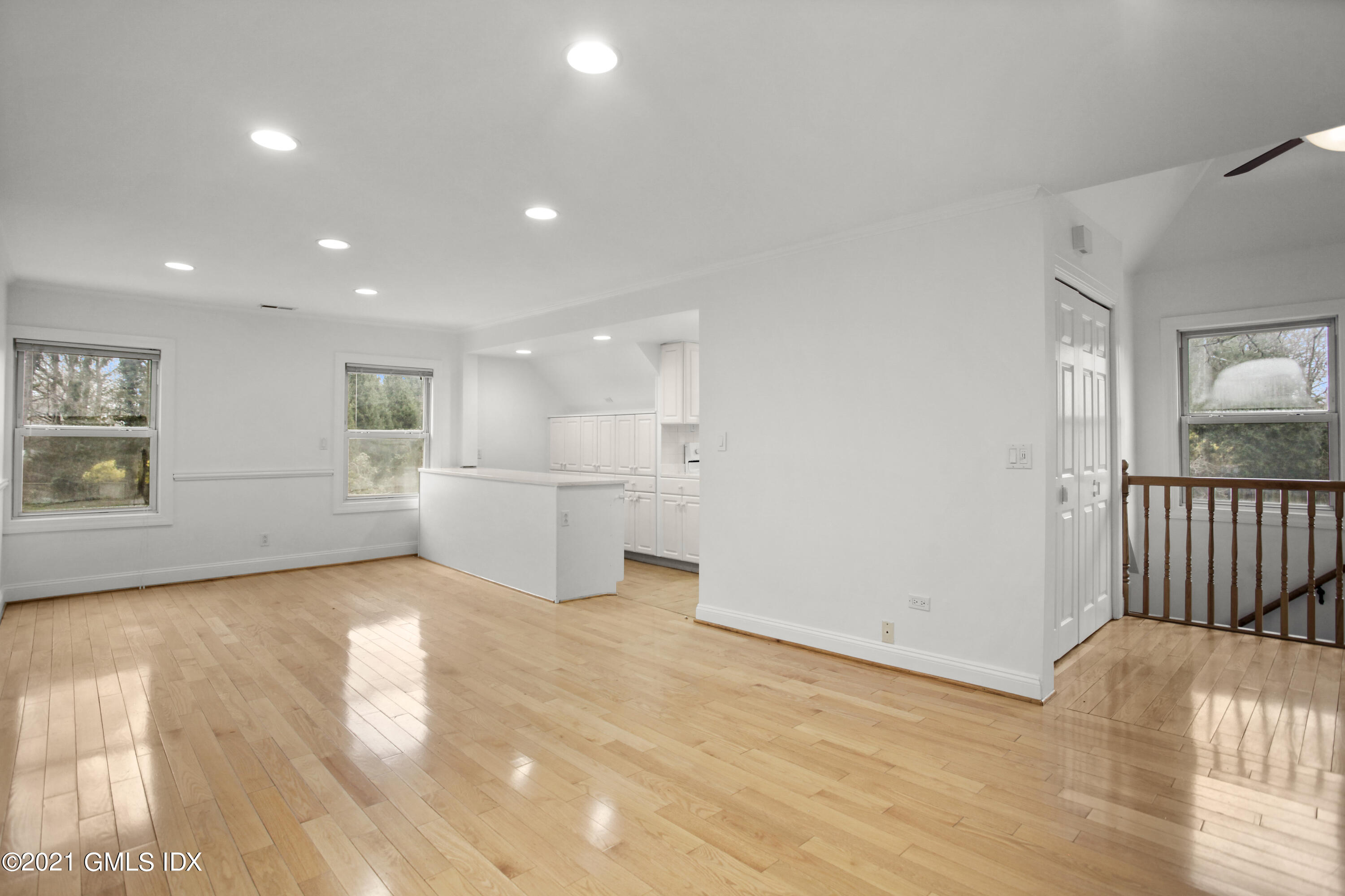 52 Bruce Park Drive, Unit B Greenwich, CT 06830 - Photo 2 of 20 a view of a kitchen with a sink and a window