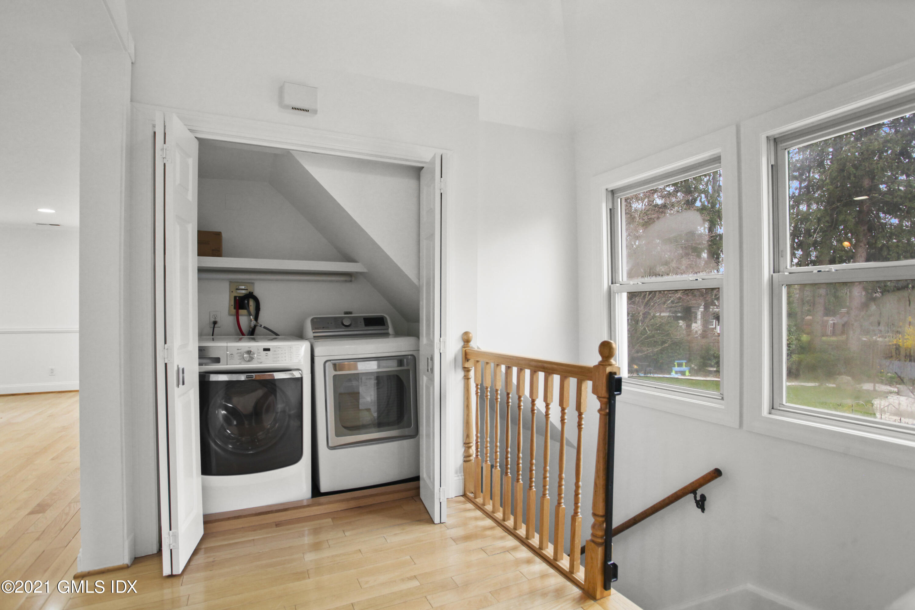 52 Bruce Park Drive, Unit B Greenwich, CT 06830 - Photo 10 of 20 a kitchen with stainless steel appliances granite countertop a stove and a sink