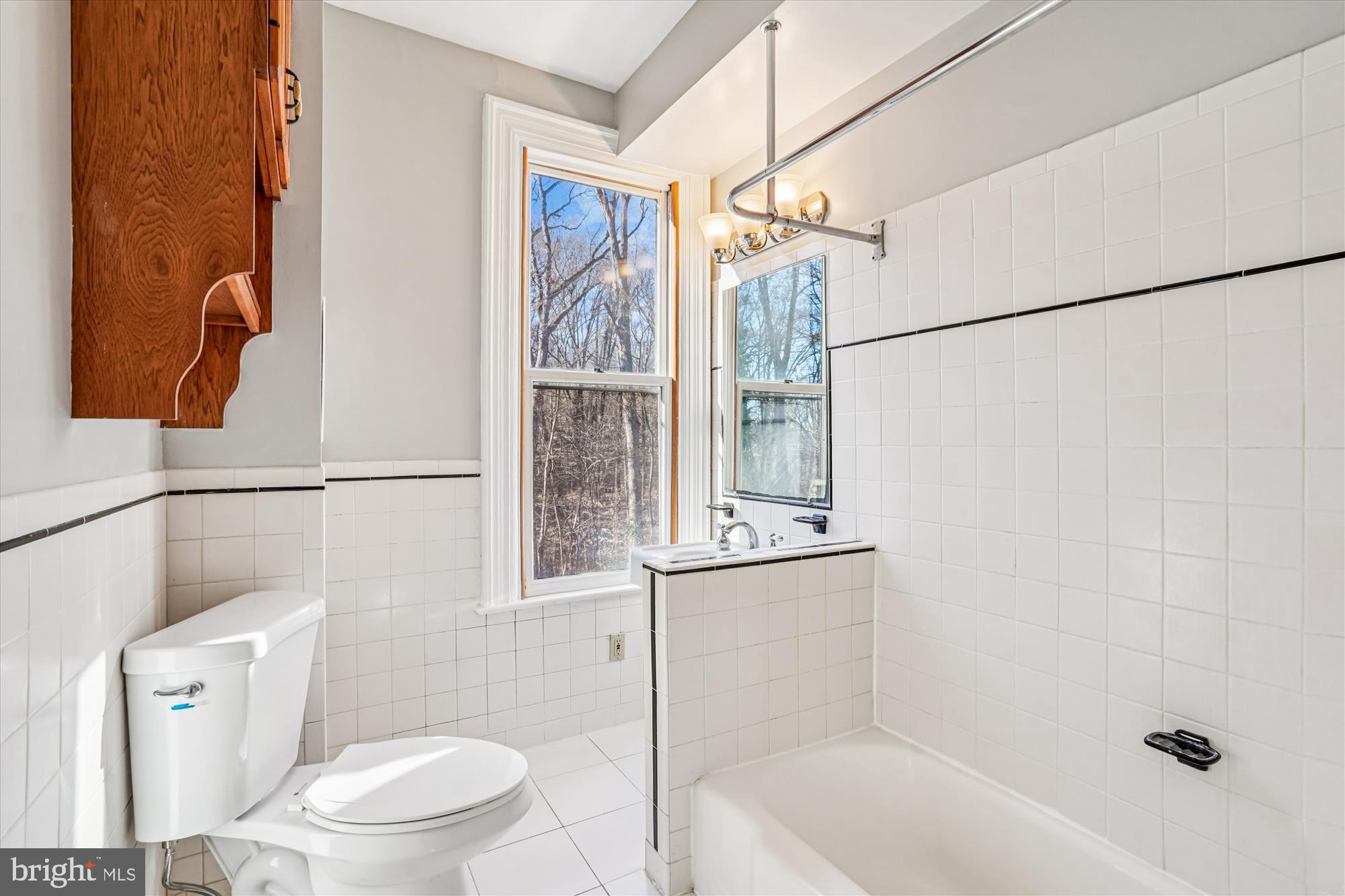 2799 Beechbank Road Silver Spring, MD 20910 - Photo 24 of 42 a bathroom with a toilet and shower