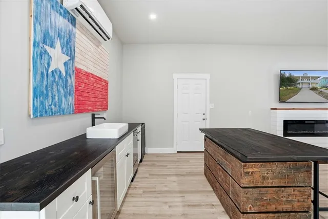 a kitchen with a stove and a sink