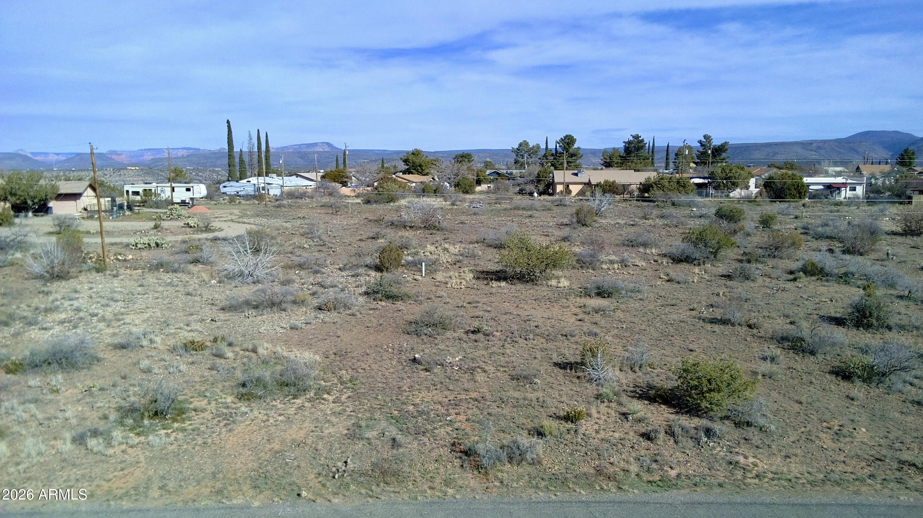 4780 Smoke Signal Way, Unit 131 Rimrock, AZ 86335 - Photo 17 of 18 a view of a dry yard with trees