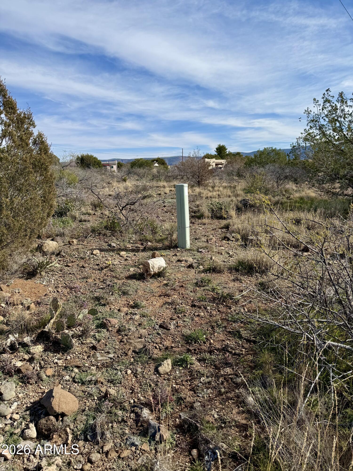 4780 Smoke Signal Way, Unit 131 Rimrock, AZ 86335 - Photo 6 of 18 a view of a building with mountains in the background