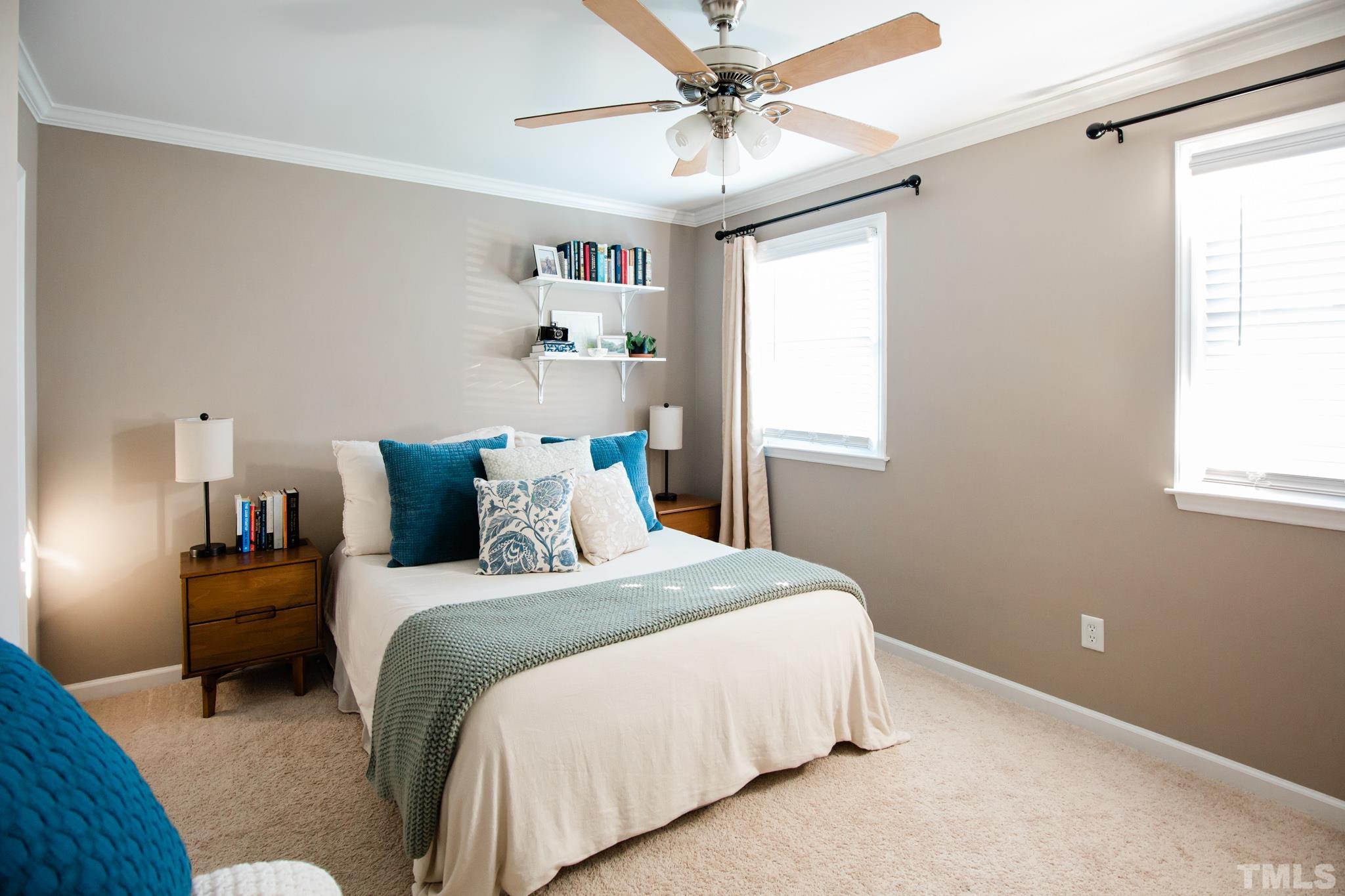 623 Little Creek Church Road Clayton, NC 27520 - Photo 28 of 47 a bedroom with a bed dresser and a window