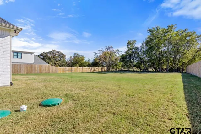 a view of an outdoor space and a yard