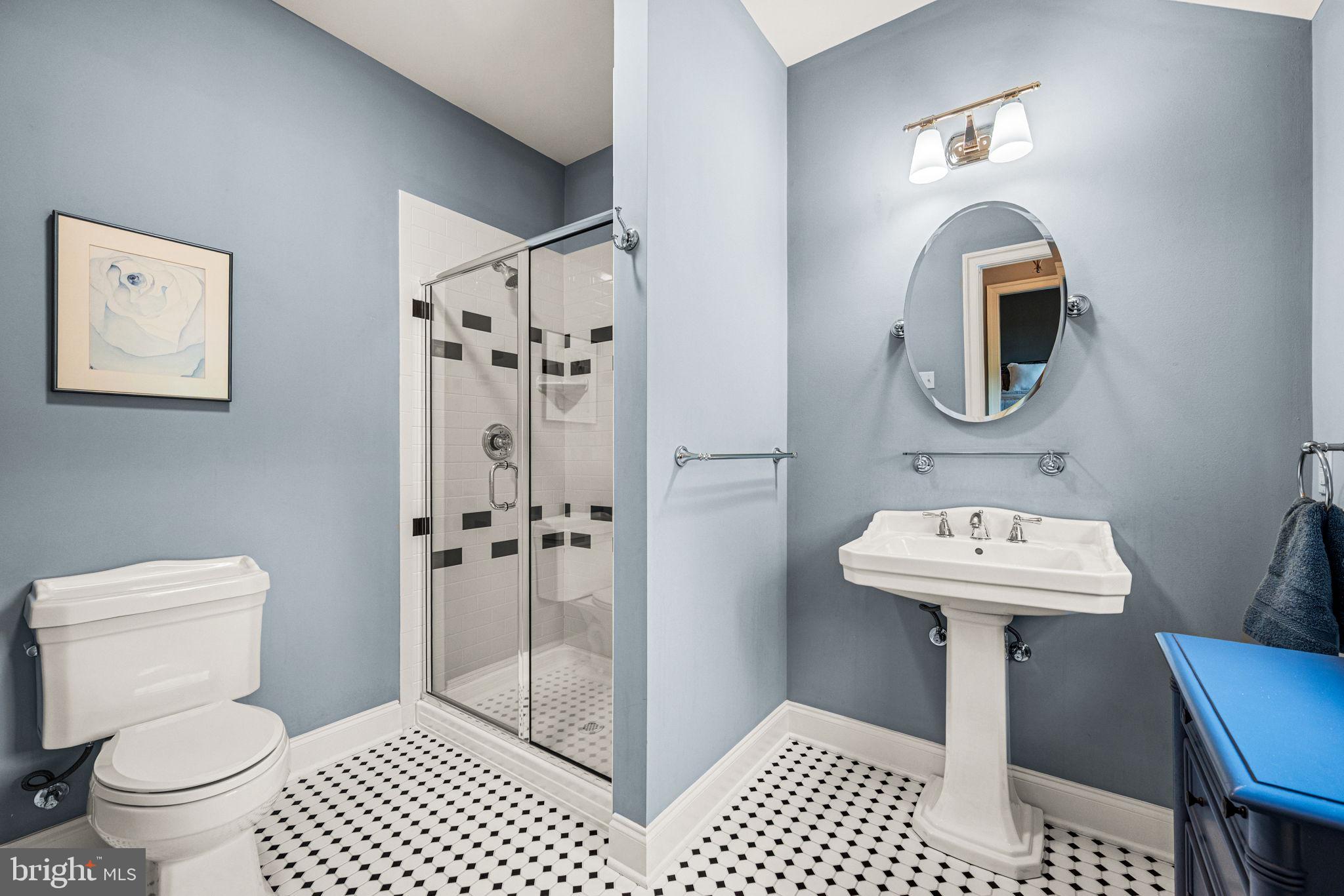 1548 Morstein Road Malvern, PA 19355 - Photo 47 of 80 a bathroom with a sink toilet and shower