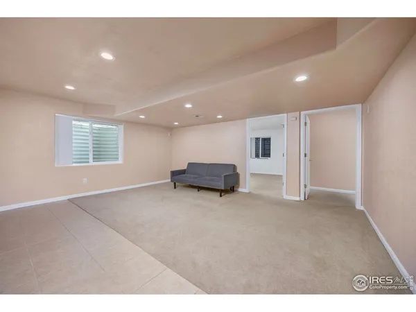 a living room with furniture and window