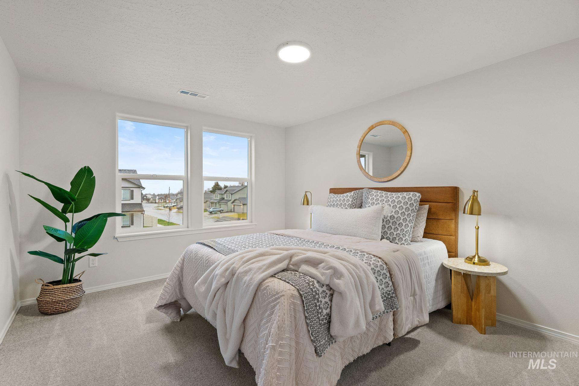 Tbd East Fitz Roy Street, Unit TALENT Kuna, ID 83634 - Photo 16 of 23 Bedroom with baseboards and light colored carpet