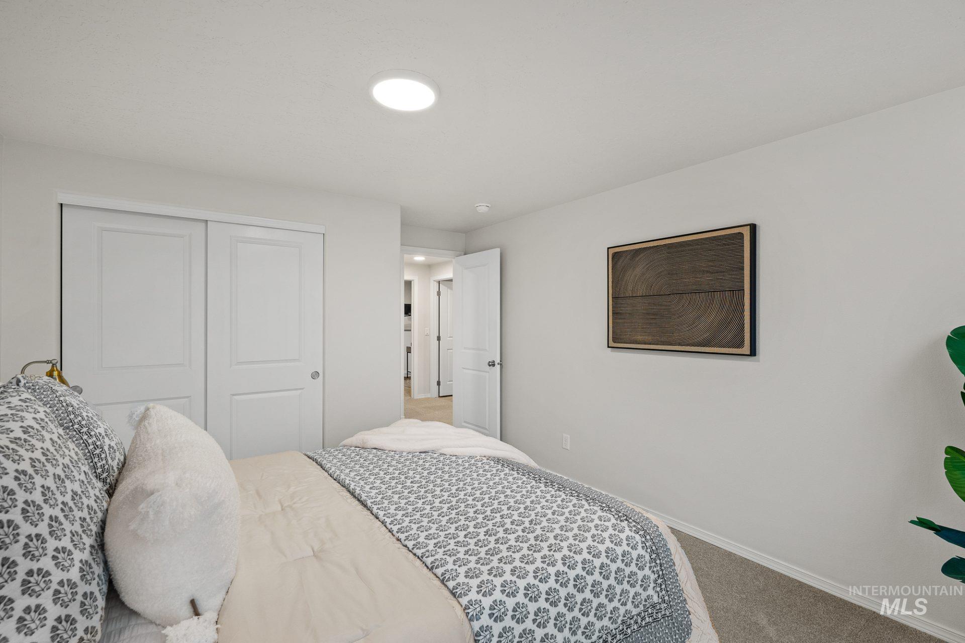 Tbd East Fitz Roy Street, Unit TALENT Kuna, ID 83634 - Photo 17 of 23 Bedroom with a closet and carpet