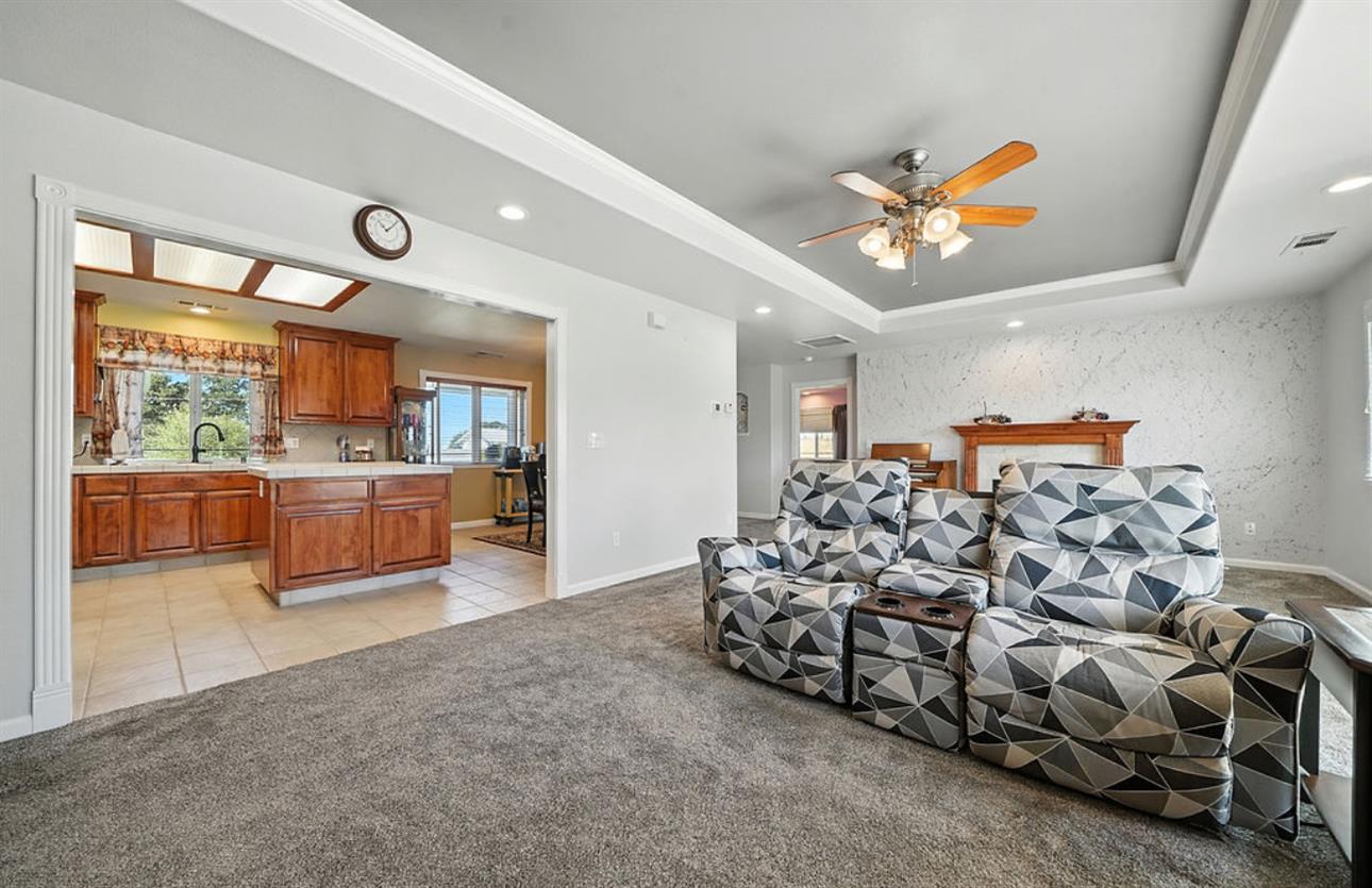 5825 Rippon Road Valley Springs, CA 95252 - Photo 13 of 45 a living room with furniture and a large window