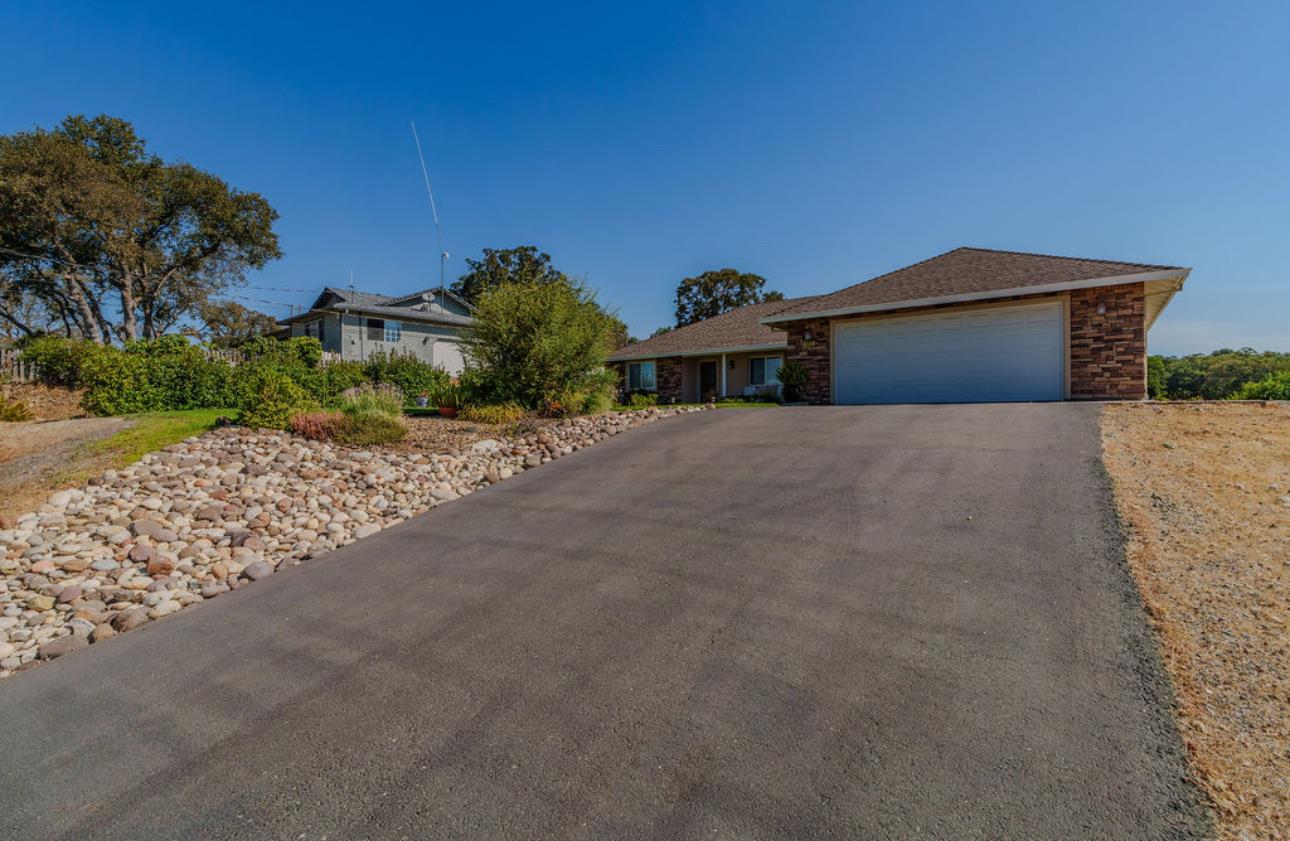 5825 Rippon Road Valley Springs, CA 95252 - Photo 2 of 45 a street view with a outdoor space