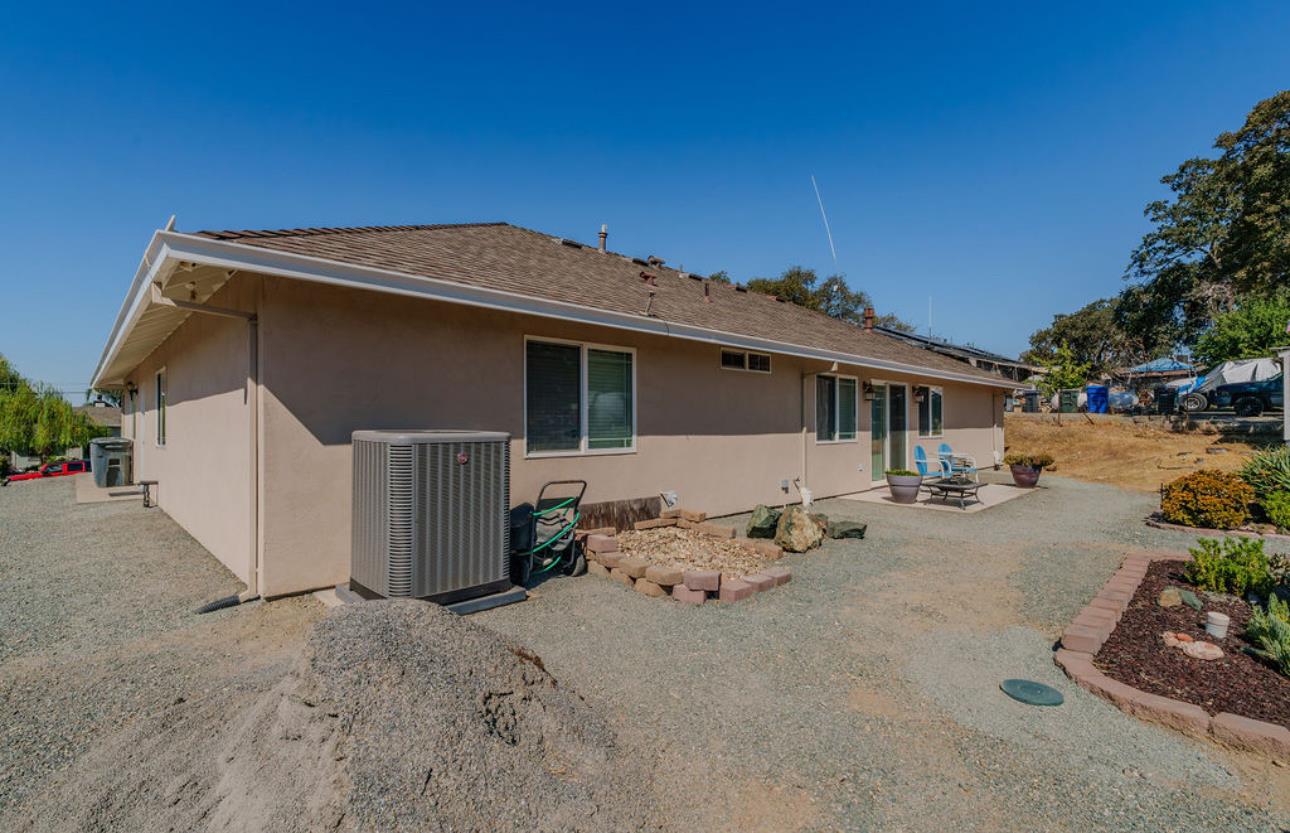 5825 Rippon Road Valley Springs, CA 95252 - Photo 40 of 45 a view of a house with backyard