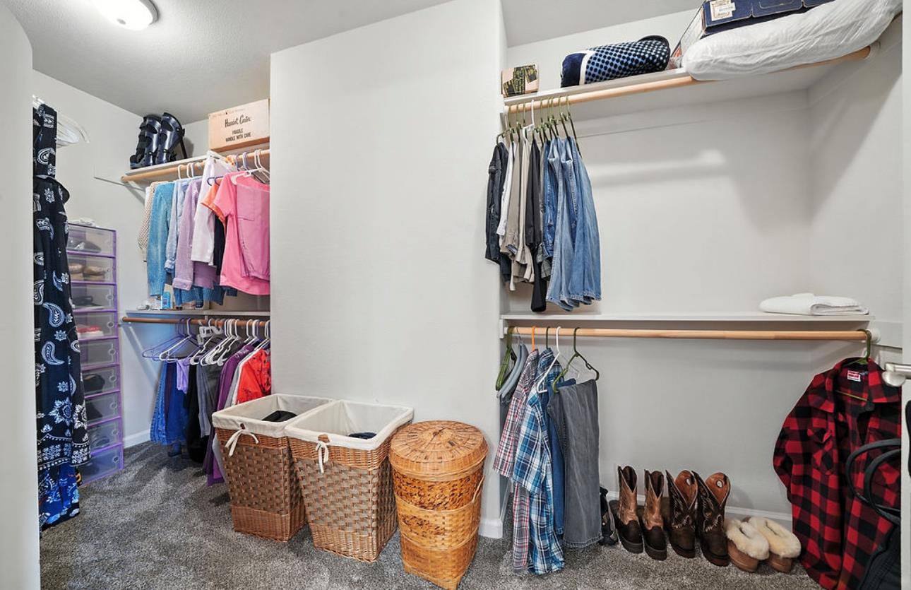 5825 Rippon Road Valley Springs, CA 95252 - Photo 43 of 45 a view of walk in closet with clothes and shoes