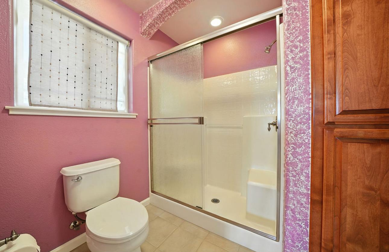 5825 Rippon Road Valley Springs, CA 95252 - Photo 44 of 45 a white toilet sitting next to a bathroom sink